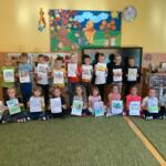 Kindergarteners with diplomas for participating in the workshops.