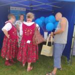 Event guests at the eco-manager's stand.