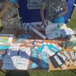 Informational and educational materials at the booth.