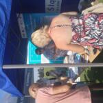 Guests visiting the booth.