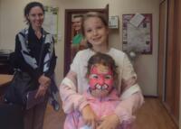 A family in the eco-manager's office.
