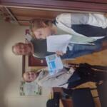 A family in the eco-manager's office.