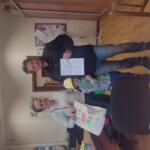 A family in the eco-manager's office.