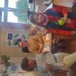 A family in the eco-manager's office.