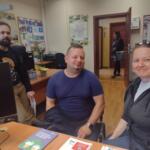 A family in the eco-manager's office.