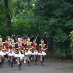 A majorette parade in the park.