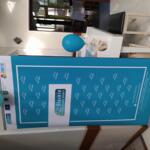The eco-manager's information booth with educational materials.