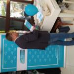 A man standing at the eco-manager's information point.