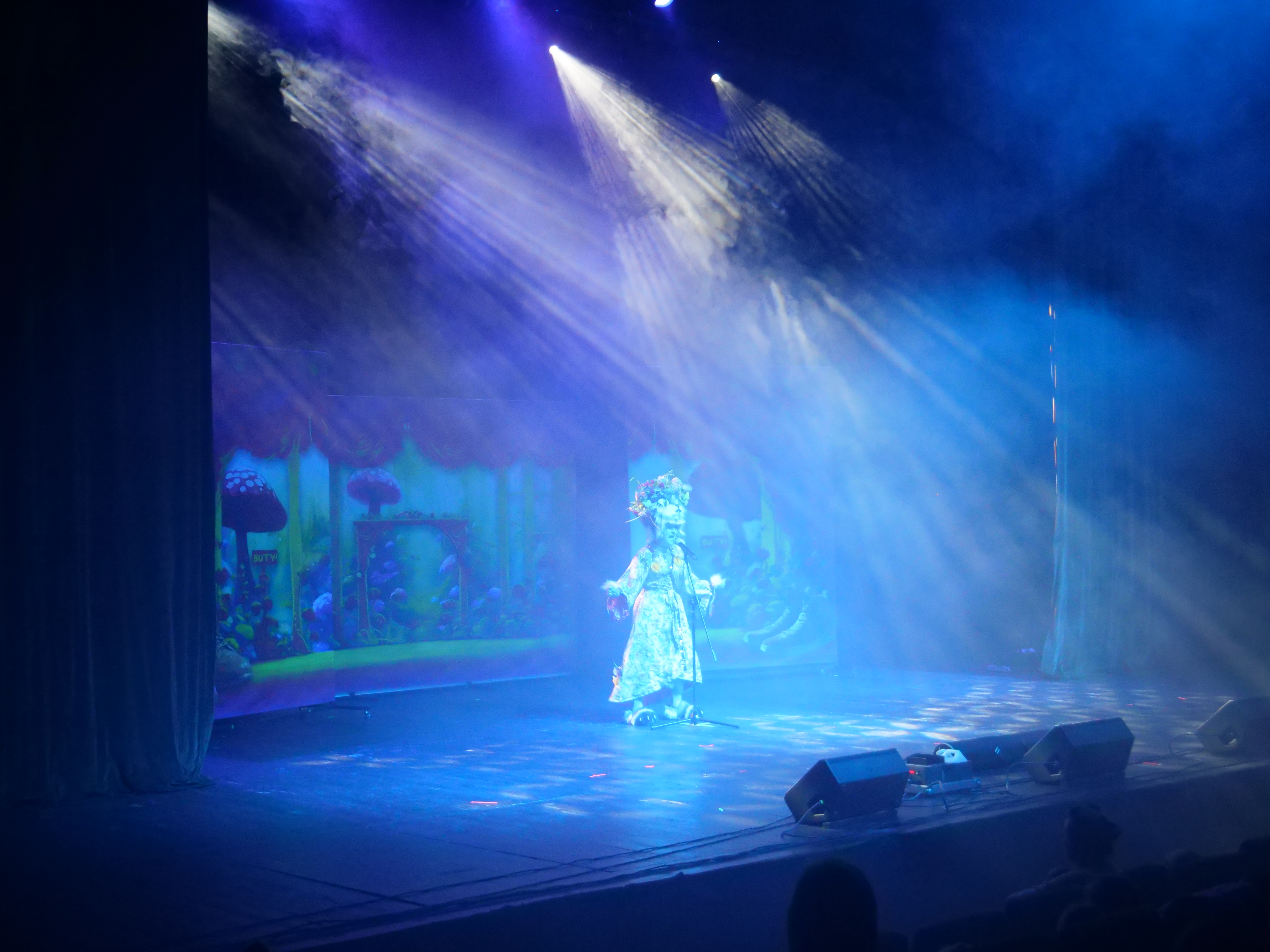 An actress from the play on the stage.