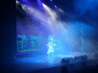 An actress from the play on the stage.