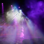 An actress from the play on the stage.