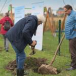 Participants on the walk planting trees.