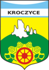Logo Gminy Kroczyce zawiera napis Kroczyce oraz fragmenty skał